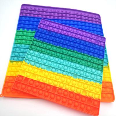 China 40cm soft round elastic sensory noise silicone fidgety press fingertip checkerboard square itting toys soft toy for sale