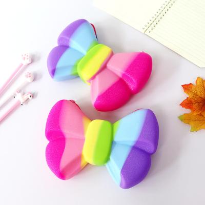 China 2022 New Design Soft Zipper Busy Person Toy Pencil Case School Bowknot Pop It Pencil Pouch For Kids for sale