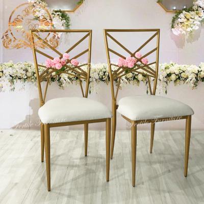 China Modern Hotel and Banquet Furniture Gold X Backrest Metal Iron Chairs for Sale for sale