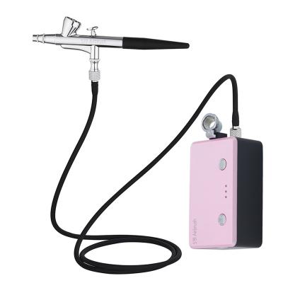 China 519 Professional Airbrush Patent 2023 New Hot Cake Decorating Temporary Nail Tattoo Airbrush With Compressor AF200-136 for sale