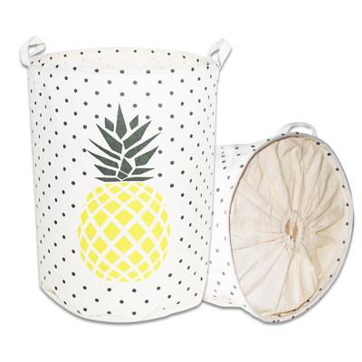 China Colapsable Pineapple Printed Eco-Friendly Hamper Clothing Folding Canvas Laundry Storage Hamper With Cover for sale