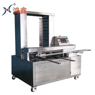 China HONMGXIN Food Brand Hot-selling Automatic Tray-Setting Machine for sale