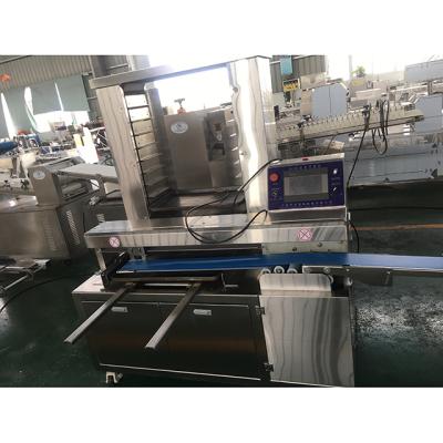 China High Quality Frozen Food Machine LM-260 Automatic Frozen Biscuit LM-260 Tray-Arranging Machine for sale