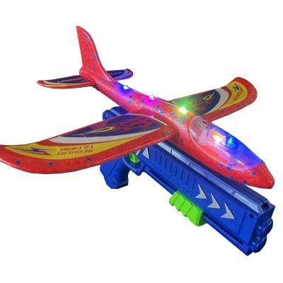 China 2022 New Next Gun Toy ejection Shooting Or Hand Throw Slide With Catapult Airplane Light Outdoor Toy Gun for sale