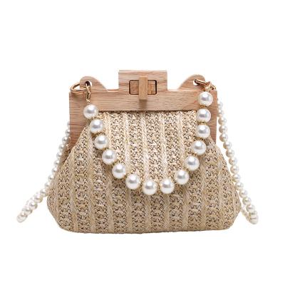 China High Quality Straw Bag Women Hand-Woven Handbags and Clips 2022 Summer Wooden Rattan Casual Beads Beach Small Shoulder Cross - Body Bag for sale