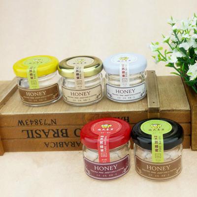 China Hot Selling Steamable Wholesale Price 25ml Small Glass Jar For Honey And Jam for sale