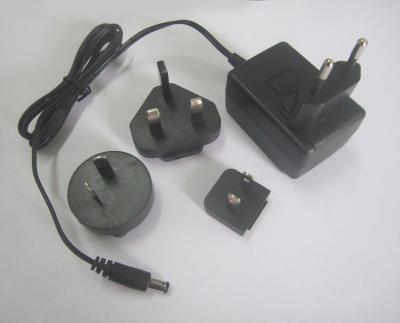 China 24V network device plug in switching inter-changeable AC plug power charger for sale