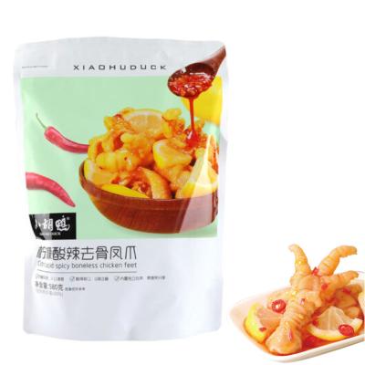 China Xiao Hu Duck Supplier Natural Delicious Vacuum Packed Chinese Food 580g Spicy Citric Acid Boneless Chicken Feet Legs Spicy Snacks for sale