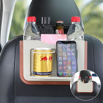 China 2022 New Arrival Geometric Universal Waterproof Auto Hanging Mini Plastic Car Trash Can Portable Rear Bag for sale