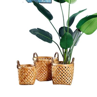 China New Ins Style Eco-Friendly Woven Wood Chip Storage Basket Circular Hollow Basket With Handle for sale