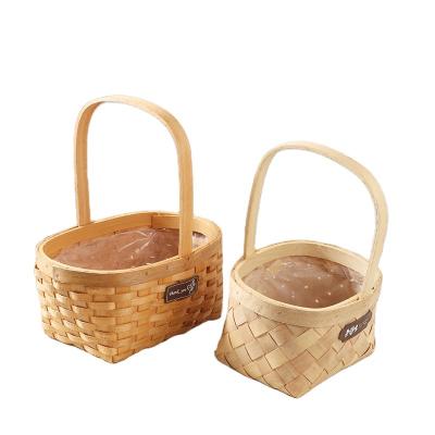 China Europe Woodchip Woven Storage Flower Basket With Plastic Handle And Liner for sale