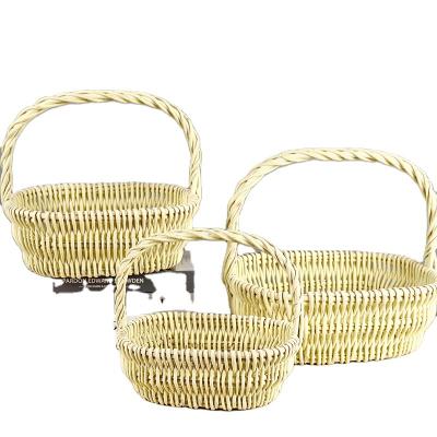 China Eco-friendly Durable Hot Design Handmade Natural Rattan Flower Basket For Storage Wedding Gift With Handle for sale