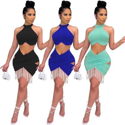 China Women Two Piece Halter Crop Top And Hollow Out Skirt Tassel Long Dress Set for sale