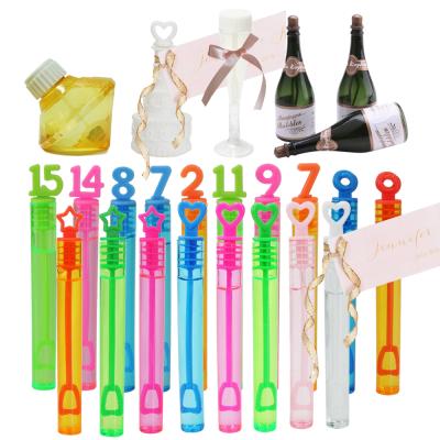 China Bubble Outdoor Champagne Bottle Soap Bubble Tube Wedding Party Bulk Bubble Toy for sale