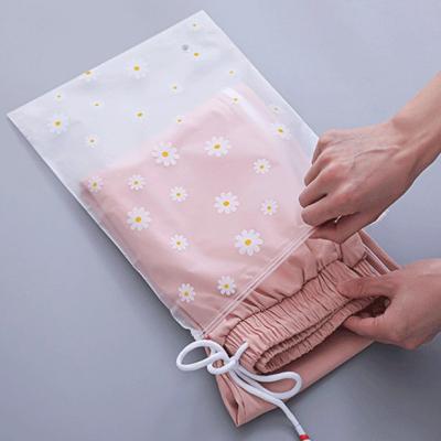 China Recycled Materials Three Side Sealed Plastic Packaging Slider Ziplock Bags For Clothes for sale