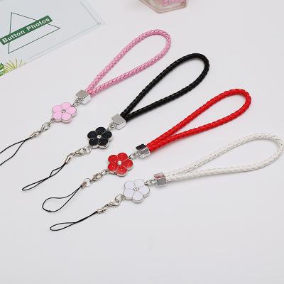 China FASHIONABLE Soft Lanyard Wrist Jewelry Cute Phone Hanging Rope Woven Leather Flowers Wrist Hand Lanyard Anti Lost Mobile Phone for Women for sale