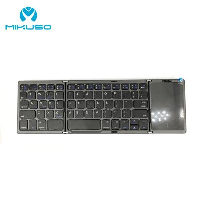 China Mini Slim Rechargeable Wireless Portable Keyboard With Touchpad Wireless Foldable Keyboard for sale