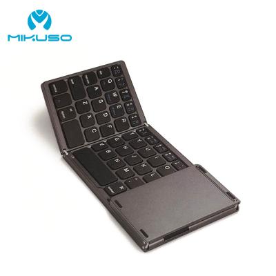 China Wireless Rechargeable Wireless Folding Keyboard BTF35 64 Keys Portable Mini Foldable Wireless Keyboard for sale