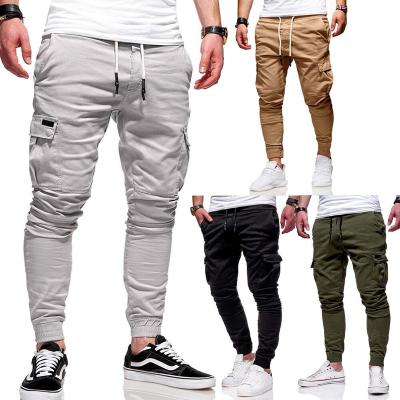 China Anti-wrinkle men's sports running jogging pants football gym leggings pockets pants sporty elasticity panties for sale