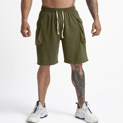 China Sustainable Mens Shorts Summer Solid Color Loose Plus Size Sports Running Pants With Big Pockets for sale