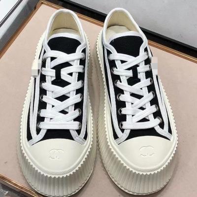 China Fashion Trend Luxury Small White Shoes Embroidered Round Lace Up Toe Casual Sneakers Women Simple Classic Letters Canvas Shoes Women Design for sale