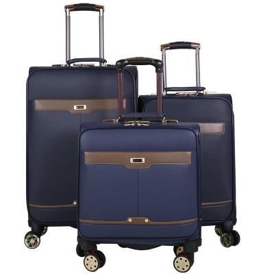 China Custom Metallic Luxury Travel Suitcase Trolley Luggage Bag 4 Wheels Carry On Trolley Bags for sale