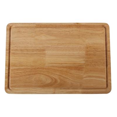 China Sustainable Premium Solid Wood Kitchen Organic Bamboo Wooden Cutting Board Chopper With Drip Juice Groove for sale