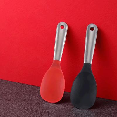 China Viable Multifunctional Kitchen Heat Resistant Nonstick Household Serving Large Stainless Steel Silicone Silicone Scoop Rice Spoon for sale