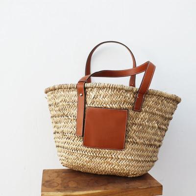 China Top Pocket Tote Basket Handbag Purse Wholesale Fashion PU Rattan Handle Summer Beach Straw Handbag for sale