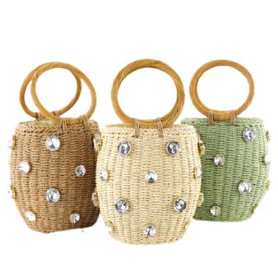 China Straw Woven Basket Fashion Women Handbag Handmade Rhinestone Bucket Lady Straw Handbag With Hand Fashion Gift for sale