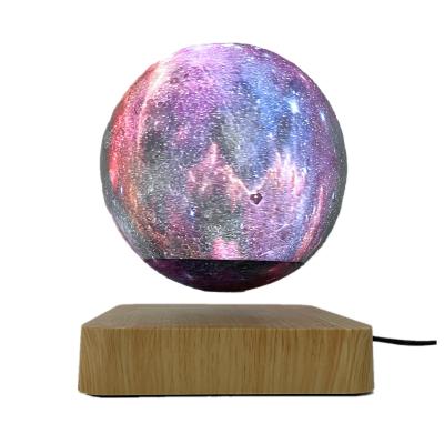 China Minimalist New Design Galaxy Lamp Creative Gift Table Lamp HCNT Magnetic Levitating Galaxy Moon Floating Floating Lamp for sale