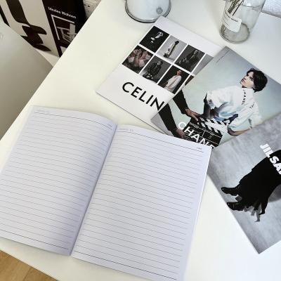 China Eco-friendly Magazine cover notebook photography props model Street clapping hands holding decorative scenes posing photography props for sale