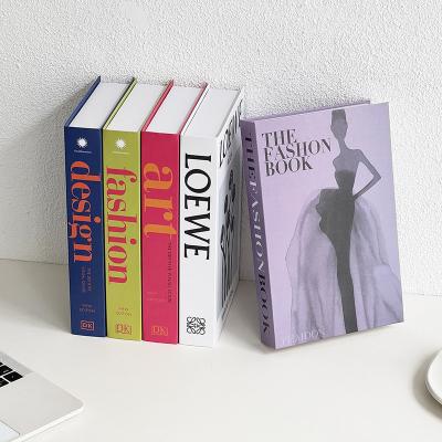 China Eco-friendly Fashionable faux books home decoration famous brand decor modern luxury books faux decorative book for sale