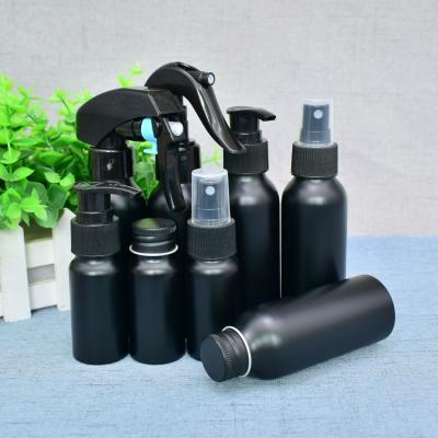 China 30ml Empty Black Luxury Cosmetic Packaging Bottle 1oz Aluminum Lotion Press Bottle / Spray Pump for sale