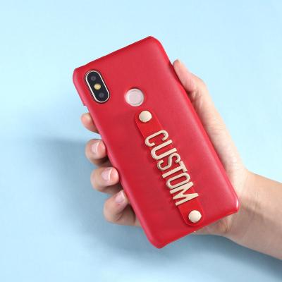 China Original Standing Leather Phone Case Dropshipp Strap Gold Metal Name Phone Case For Samsung Galaxy S8 910 Plus Note 8 9 A50 Phone Funda Coque for sale