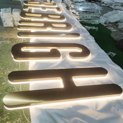 China High quality well made brushed translucent steel buildings gold lighting letter back sign for store mall for sale