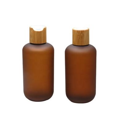 China Personal Care 250ml PET Bottle With Bamboo Disc Cap For Toner, Essential Oil, Lotion for sale