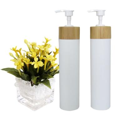 China Consumer Electronics Packaging 250ml HDPE Plastic Bottles With Bamboo Pump For Shampoo And Body Lotion for sale