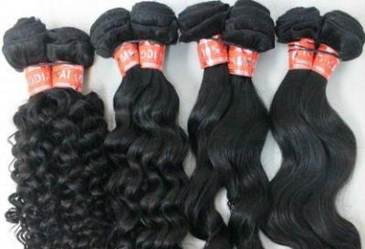 Cina Capelli lunghi di estensioni dei capelli cambogiani del vergine a 30 pollici/capelli ricci del vergine in vendita