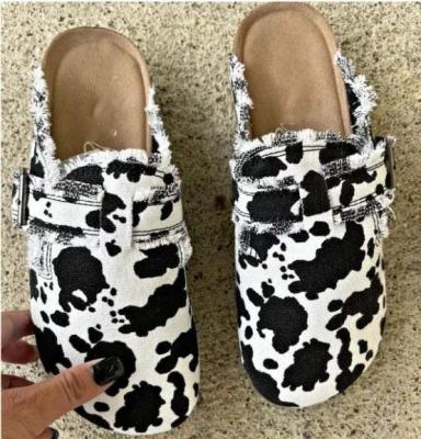 China 2022 Hot Sale Fashionable Casual Flat Canvas Flat Slippers Cow Leopard Print Half Slippers Shoes For Women for sale