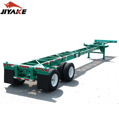 China Hot Selling 3 Axles Container Skeleton Semi Truck Trailer 50 Tons 20FT 40FT Cargo Flatbed Truck Trailers Skeleton Trailer With Twist Lock for sale