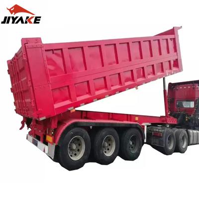 China Hot Sale Jiyake 3 Axle 4 Axle Grain Transport 35/40 CBM Tipper Trailer Truck Trailer 60 Ton Dump Cargo Rear End Unloader Semi Trailer for sale