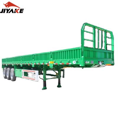 China Chinese manufacture Jiyake truck trailer 2 3 4 axle 40FT 20 45FT dropside board side wall barrier trailer side wall cargo trailers semi trailer for sale