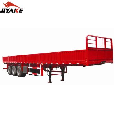 China Truck Trailer Factory Direct Sale Customized 2 3 4 Axle 60 Ton Dropside Board Side Wall Barrier Trailer Semi Truck Trailers for sale