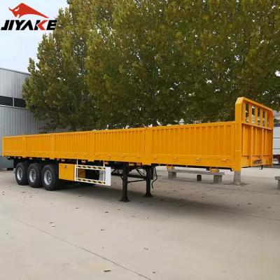 China Truck Trailer 40 Ton 3 Axle 4 Axle Fence Drop Side Wall Board Semi Trailer Cargo Transport Container Truck Flat Bed Semi Trailer for sale