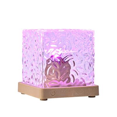 China Modern Water Wave Pattern Ambient Night Light USB Rotating Projection Crystal Remote Control Starlight Projection Table Lamp for sale