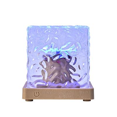 China Modern Dynamic Water Wave Pattern Ambient Night Light USB Rotating Projection Crystal Remote Control Starlight Projection Table Lamp for sale