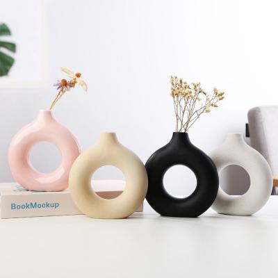 China Modern Wholesale Custom Colorful Decor Home Round Ceramic Hollow Circle Flower Donut Vase for sale