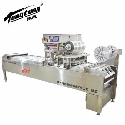 China Automatic Food Baked Goods Tray Sealing Vacuum Packing Machine for sale