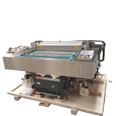 China Model DZ-1090 Continuous Belt Type Vacuum Sealing Food Packing Machine for sale